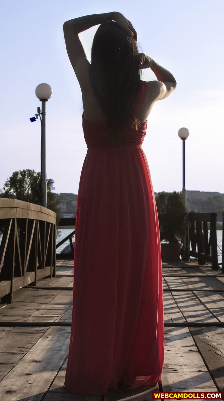 Black Haired Girl in Red Long Dress on Webcamdolls